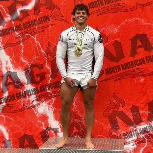 Tournament podium, gold medal